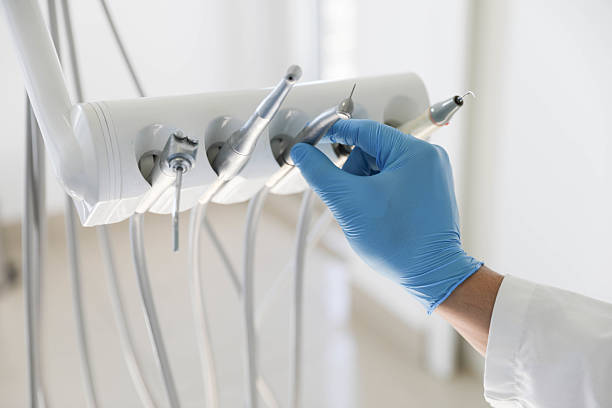 Professional Tooth Extraction technician working in Kingston Estates, NJ